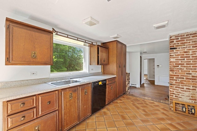 48 Elm St, Newfield, ME 04095 - kitchen with dishwasher, brown cabinetry, light tile patterned flooring, and a baseboard heating unit