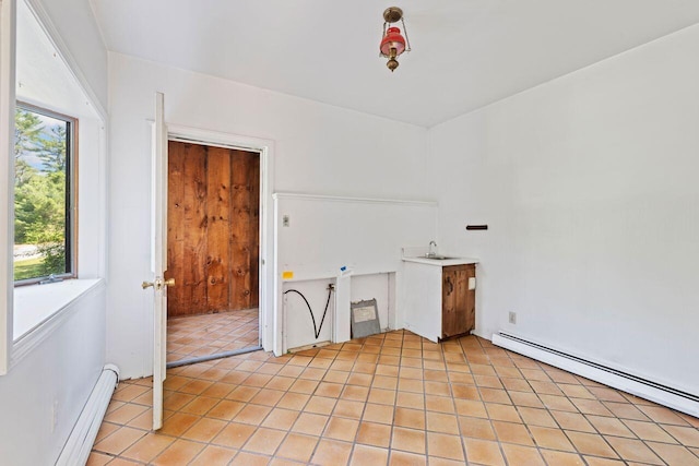 48 Elm St, Newfield, ME 04095 - spare room featuring a baseboard heating unit and light tile patterned floors