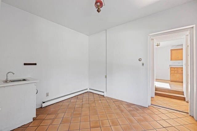48 Elm St, Newfield, ME 04095 - unfurnished room with baseboard heating and light tile patterned floors
