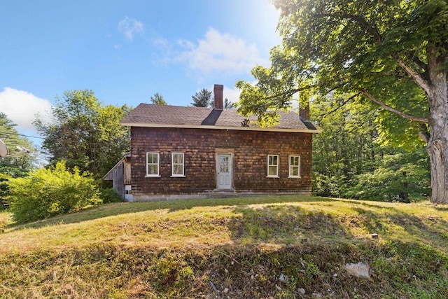 48 Elm St, Newfield, ME 04095 - view of front of property with a chimney, a front lawn, and roof with shingles