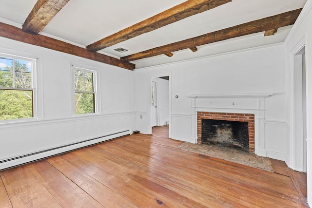 48 Elm St, Newfield, ME 04095 - unfurnished living room with a baseboard radiator, hardwood / wood-style flooring, beamed ceiling, and a brick fireplace