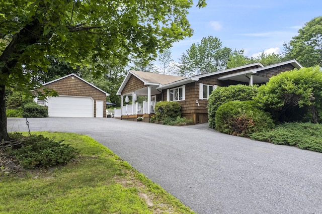 38 Tarr Ave, Lewiston, ME 04240 - single story home with an outdoor structure and a garage