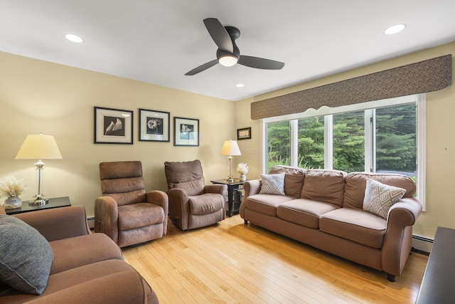 38 Tarr Ave, Lewiston, ME 04240 - living area featuring light wood-style flooring, ceiling fan, a baseboard radiator, and recessed lighting