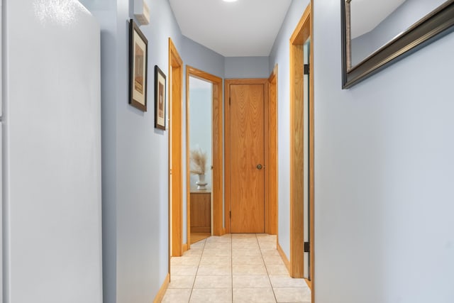 38 Tarr Ave, Lewiston, ME 04240 - hallway featuring baseboards and light tile patterned floors