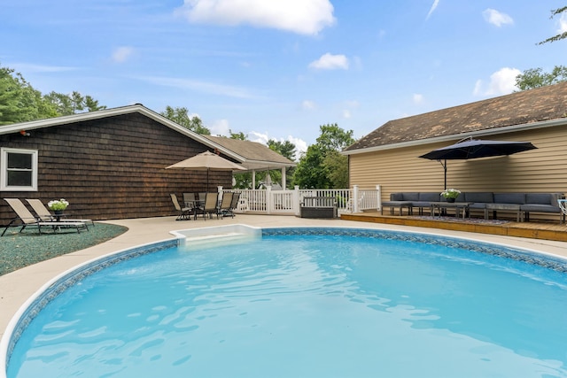 38 Tarr Ave, Lewiston, ME 04240 - view of swimming pool with an outdoor hangout area, outdoor dining area, and a wooden deck