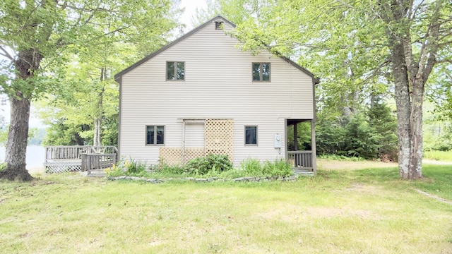 270 Grant Rd, Sullivan, ME 04664 - rear view of house with a yard and a deck