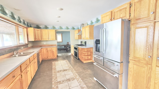 270 Grant Rd, Sullivan, ME 04664 - kitchen with appliances with stainless steel finishes, light brown cabinetry, light tile patterned flooring, and healthy amount of natural light