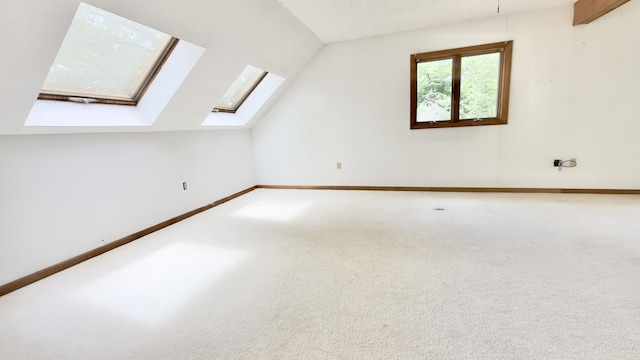 270 Grant Rd, Sullivan, ME 04664 - bonus room with a skylight, plenty of natural light, lofted ceiling, and carpet