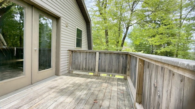 270 Grant Rd, Sullivan, ME 04664 - wooden terrace with french doors and view of wooded area