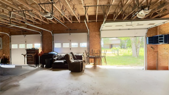 270 Grant Rd, Sullivan, ME 04664 - garage with a garage door opener and electric panel