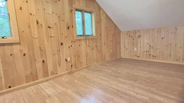 270 Grant Rd, Sullivan, ME 04664 - additional living space with wood finished floors, lofted ceiling, and wooden walls