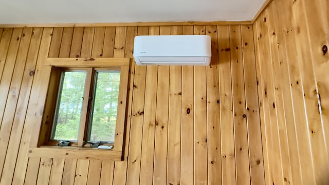 270 Grant Rd, Sullivan, ME 04664 - detailed view of a wall unit AC and wooden walls