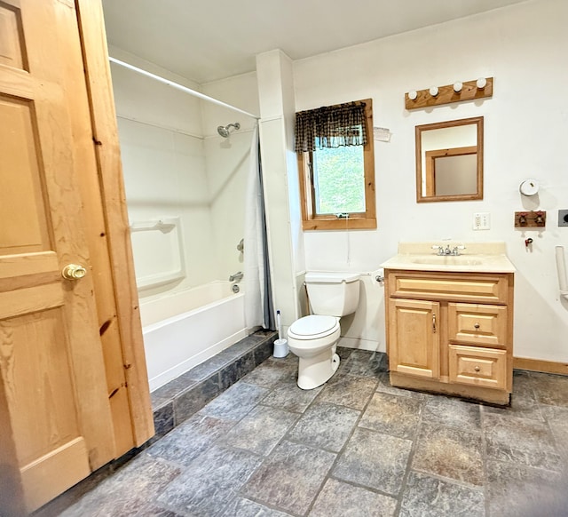 270 Grant Rd, Sullivan, ME 04664 - full bath with vanity, shower / bath combo, and stone finish floors