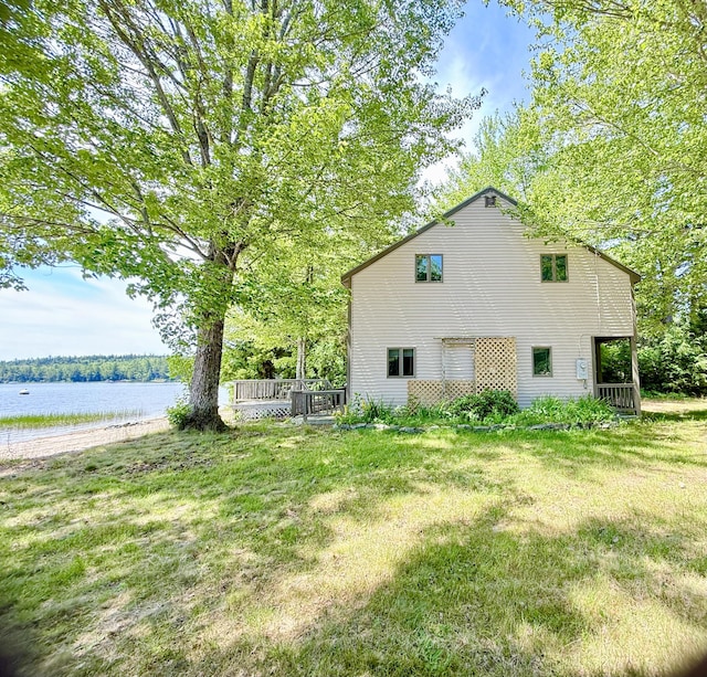 270 Grant Rd, Sullivan, ME 04664 - view of side of home with a water view and a lawn