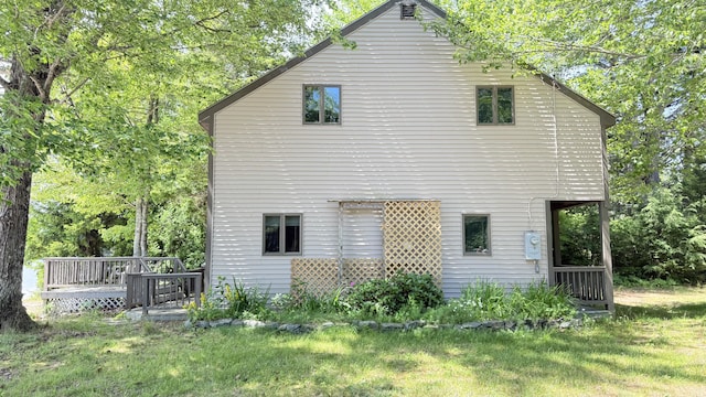 270 Grant Rd, Sullivan, ME 04664 - back of property with a lawn and a wooden deck