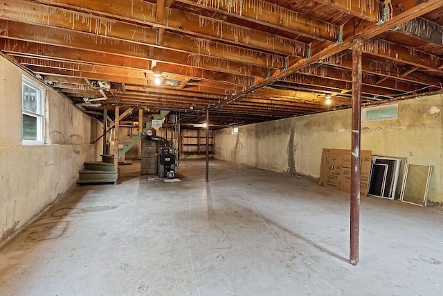 329 Reed Rd, Windsor, ME 04363 - below grade area with stairway and a heating unit