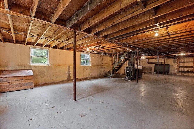 329 Reed Rd, Windsor, ME 04363 - basement with heating fuel, stairway, healthy amount of natural light, and a heating unit