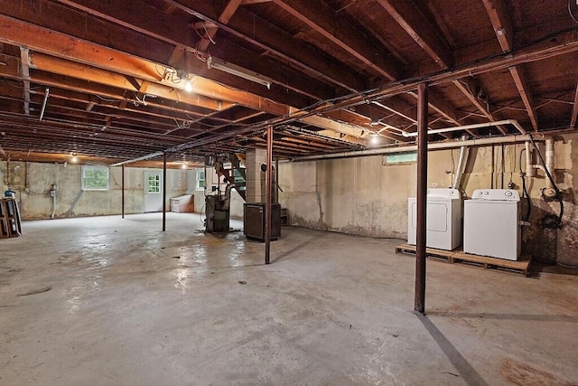 329 Reed Rd, Windsor, ME 04363 - below grade area featuring washing machine and clothes dryer and a heating unit