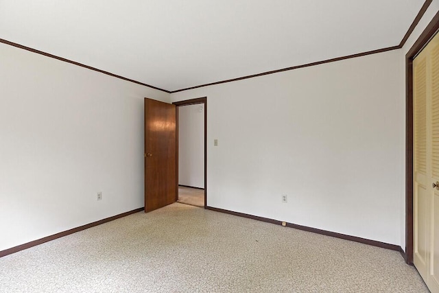 329 Reed Rd, Windsor, ME 04363 - unfurnished bedroom with ornamental molding and a closet