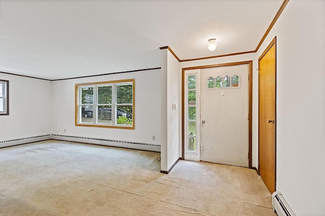 329 Reed Rd, Windsor, ME 04363 - carpeted entryway with baseboard heating and crown molding