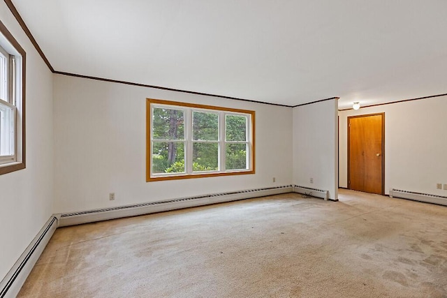 329 Reed Rd, Windsor, ME 04363 - carpeted empty room featuring a baseboard radiator and ornamental molding