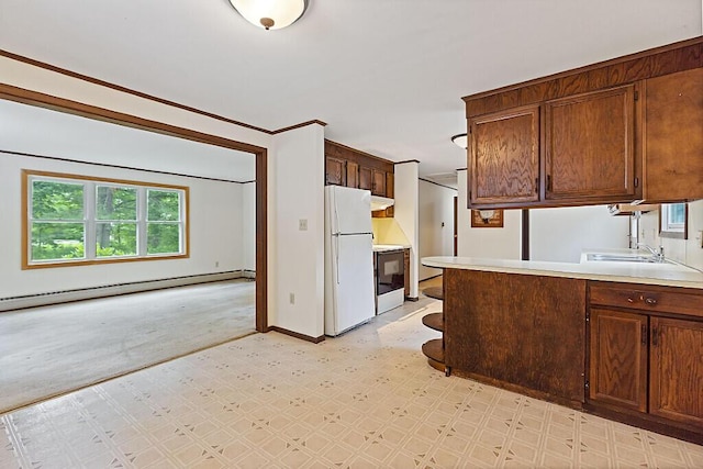 329 Reed Rd, Windsor, ME 04363 - kitchen featuring freestanding refrigerator, stove, a baseboard heating unit, and healthy amount of natural light