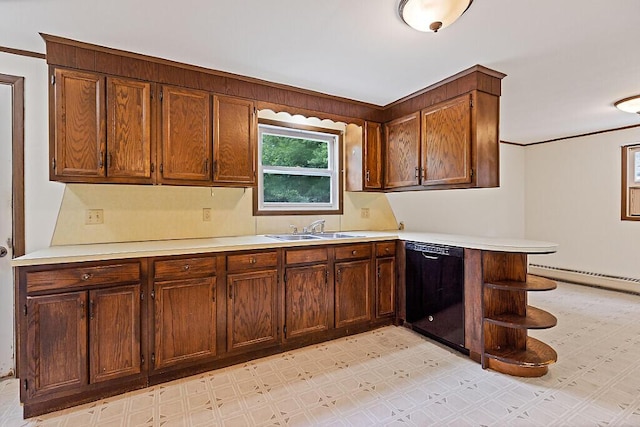 329 Reed Rd, Windsor, ME 04363 - kitchen featuring dishwasher, baseboard heating, light flooring, light countertops, and ornamental molding