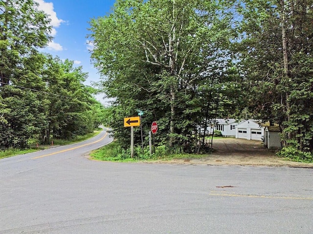 329 Reed Rd, Windsor, ME 04363 - view of asphalt street featuring traffic signs