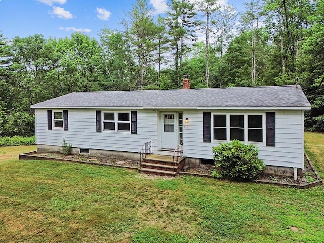 329 Reed Rd, Windsor, ME 04363 - ranch-style home featuring a front lawn, roof with shingles, a chimney, and entry steps