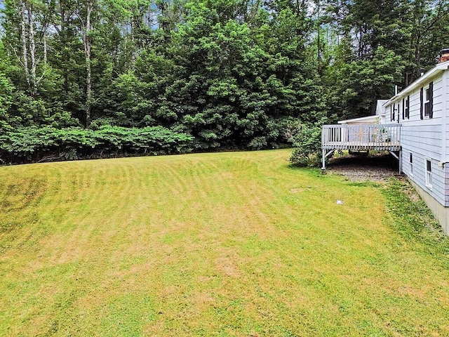 329 Reed Rd, Windsor, ME 04363 - view of green lawn featuring a deck