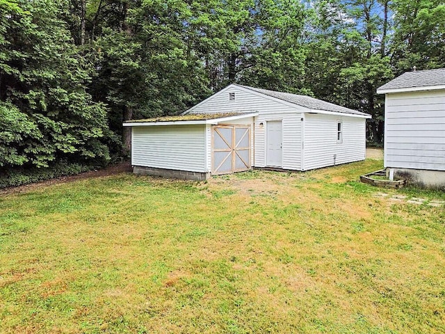 329 Reed Rd, Windsor, ME 04363 - view of green lawn with a storage shed