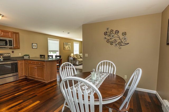13 Bremen St, Westbrook, ME 04092 - dining area with dark wood finished floors and baseboards