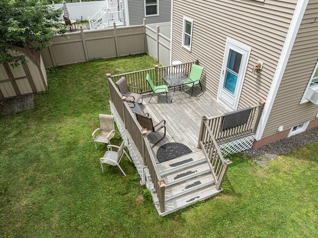 13 Bremen St, Westbrook, ME 04092 - deck featuring a fenced backyard and a storage shed