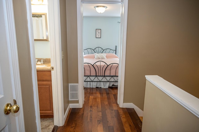 13 Bremen St, Westbrook, ME 04092 - hallway featuring dark wood-style floors and baseboards