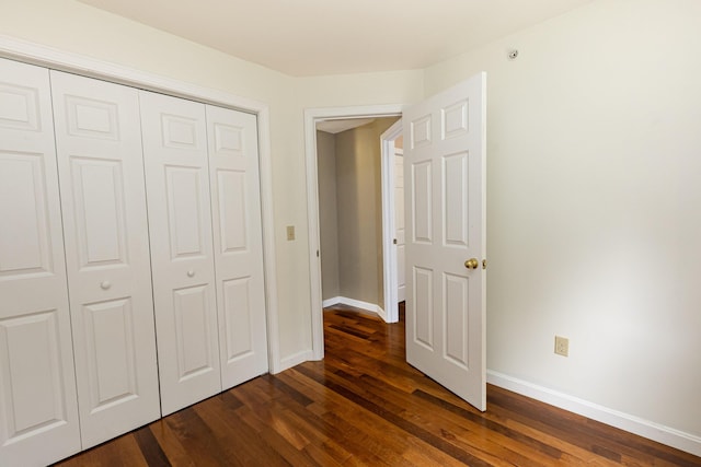 13 Bremen St, Westbrook, ME 04092 - unfurnished bedroom with dark wood-type flooring and a closet