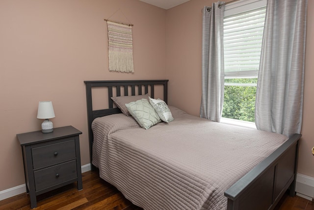 13 Bremen St, Westbrook, ME 04092 - bedroom with dark wood-style floors and baseboards