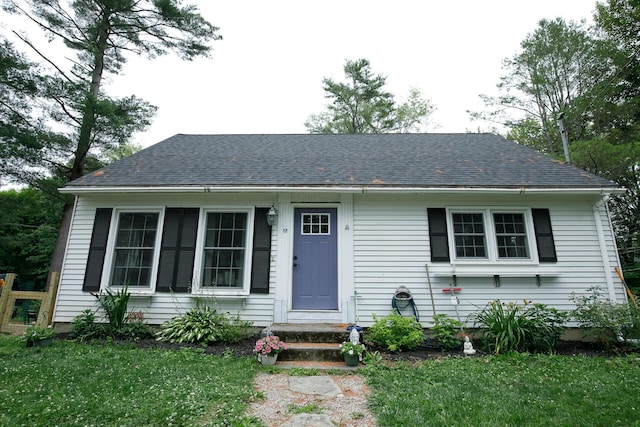 17 Duncan Rd, Augusta, ME 04330 - view of front facade with roof with shingles and a front yard
