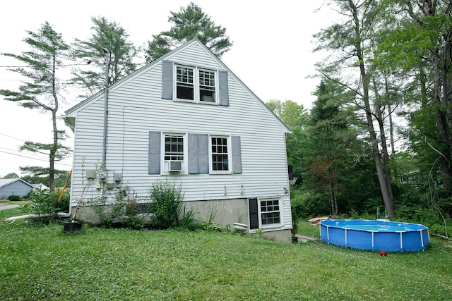 17 Duncan Rd, Augusta, ME 04330 - view of side of home with a yard and an outdoor pool