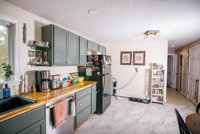17 Duncan Rd, Augusta, ME 04330 - kitchen with open shelves, freestanding refrigerator, wooden counters, and stainless steel dishwasher