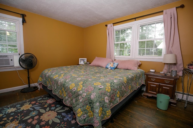 17 Duncan Rd, Augusta, ME 04330 - bedroom featuring dark wood-type flooring, a textured ceiling, and baseboard heating