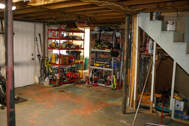 17 Duncan Rd, Augusta, ME 04330 - unfinished below grade area featuring stairs and a workshop area