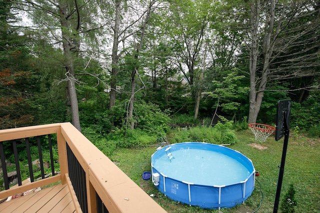 17 Duncan Rd, Augusta, ME 04330 - view of pool with a wooden deck and a yard