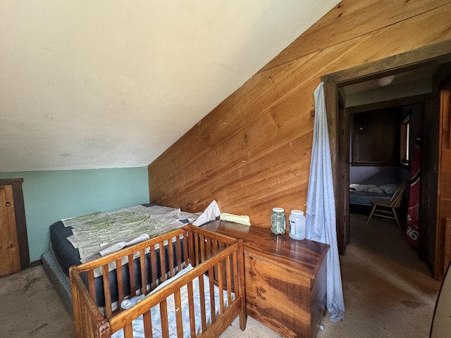 1698 Exeter Rd, Exeter, ME 04435 - bedroom with wooden walls and lofted ceiling