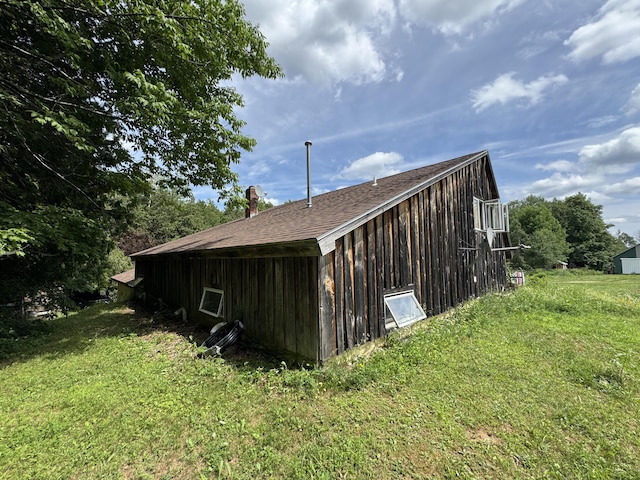 1698 Exeter Rd, Exeter, ME 04435 - view of side of home with a yard and a chimney