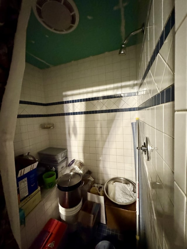1698 Exeter Rd, Exeter, ME 04435 - half bathroom with tile walls and toilet