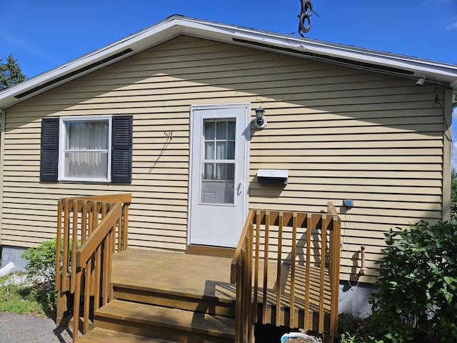 381 Birch St, Bangor, ME 04401 - rear view of house with a wooden deck
