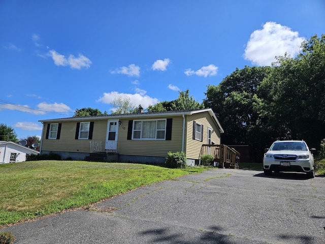 381 Birch St, Bangor, ME 04401 - manufactured / mobile home featuring a front lawn