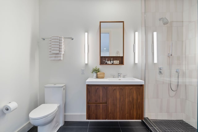 166 Fore St Unit 25, Portland, ME 04101 - full bath featuring a tile shower, vanity, and tile patterned flooring