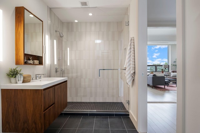 166 Fore St Unit 25, Portland, ME 04101 - full bathroom with a shower stall, vanity, tile patterned floors, and recessed lighting