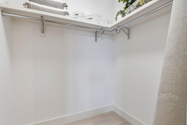 166 Fore St Unit 25, Portland, ME 04101 - spacious closet with light wood-style flooring